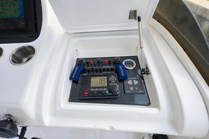 Slide: The Image of Control panel of a 2018 Bertram 35 Flybridge boat with navigation equipment. - 30