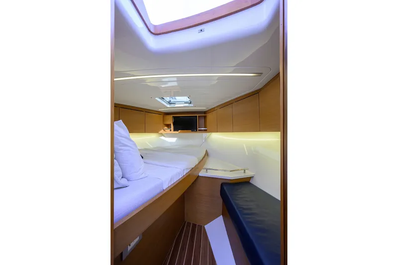 Slide: The Image of Interior cabin of 2018 Bertram 35 Flybridge yacht, featuring modern design and comfortable seating. - 40
