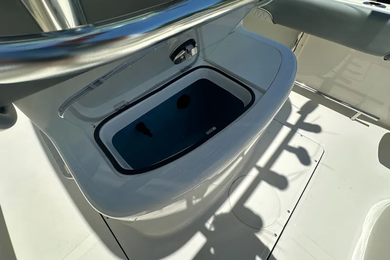 Slide: The Image of Livewell on 2027 Pioneer 222 Sportfish boat, featuring sleek design and functionality. - 12