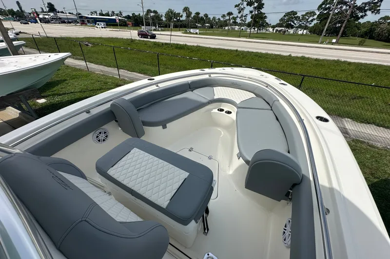 Slide: The Image of 2027 Pioneer 222 Sportfish boat with spacious seating and modern design. - 6