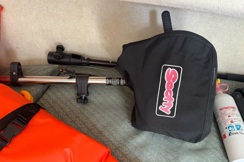 Slide: The Image of Boat equipment including a Scotty downrigger and safety gear on a 2003 Trophy 1802 Walkaround. - 27