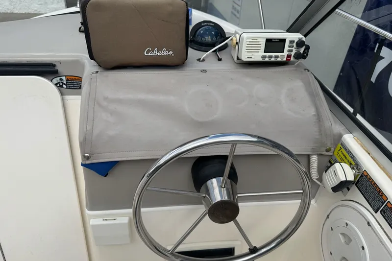Slide: The Image of Steering console of a 2003 Trophy 1802 Walkaround boat with navigation equipment. - 21