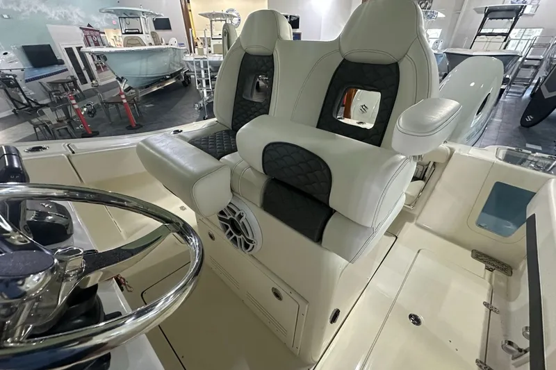 Slide: The Image of Luxury seating on 2026 Pioneer 250 Pelagic boat, featuring premium upholstery and modern design. - 13