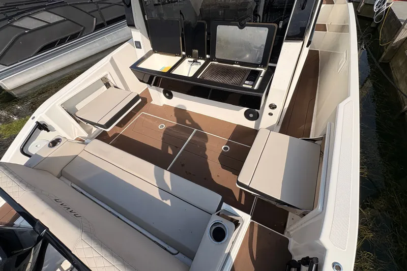 Slide: The Image of Interior of 2025 Navan C30 boat with seating and kitchenette area. - 15