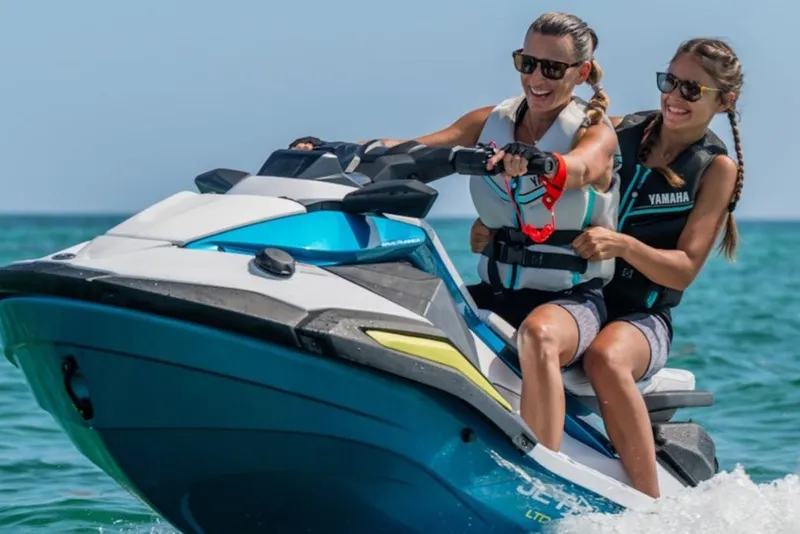 Slide: The Image of Two people enjoying a ride on a 2027 Yamaha WaveRunner JetBlaster LTD. - 6