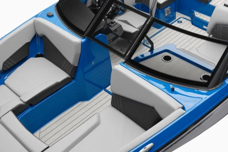 Slide: The Image of 2027 Yamaha Boats 205XD interior, featuring sleek blue and gray seating with modern design. - 9