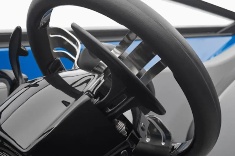 Slide: The Image of Steering wheel of 2027 Yamaha Boats 205XD, showcasing sleek design and modern controls. - 11