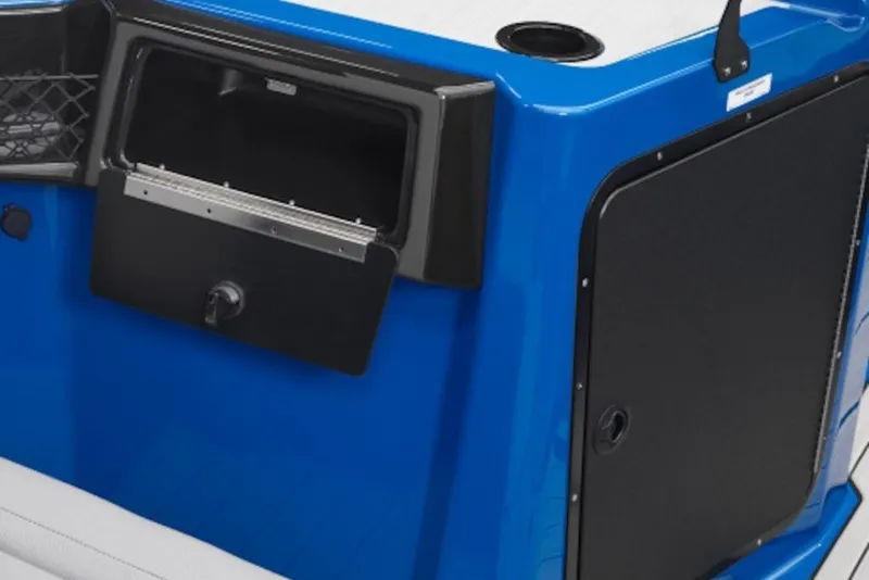 Slide: The Image of Blue Yamaha Boats 205XD 2027 model with storage compartment and sleek design. - 12