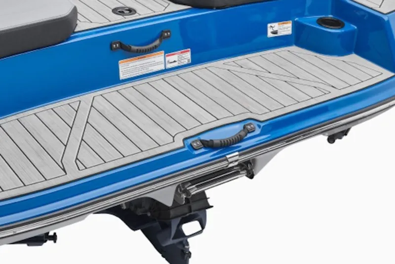 Slide: The Image of 2027 Yamaha Boats 205XD swim platform with blue trim and textured decking. - 10