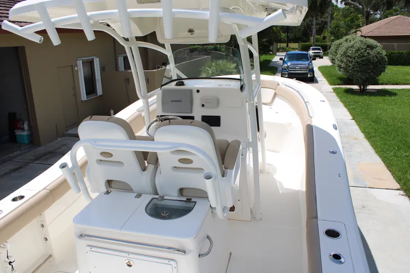 Slide: The Image of 2016 Sea Fox 288 Commander boat interior with dual seats and Garmin navigation system. - 37