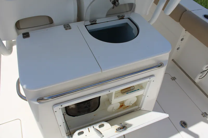 Slide: The Image of Livewell and storage compartment on a 2016 Sea Fox 288 Commander boat. - 27