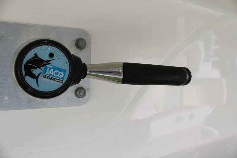 Slide: The Image of Close-up of a 2016 Sea Fox 288 Commander boat control lever with sport fishing logo. - 31