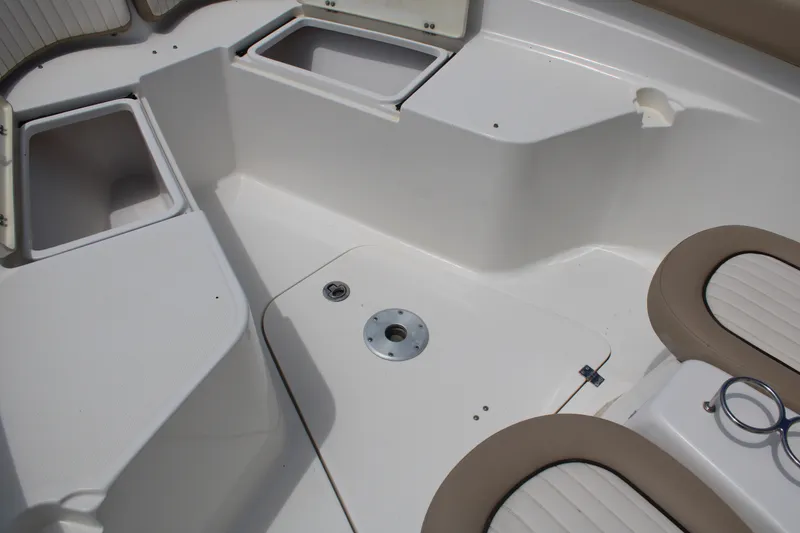 Slide: The Image of 2016 Sea Fox 288 Commander boat interior with storage compartments and seating. - 10