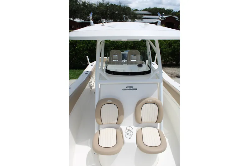 Slide: The Image of 2016 Sea Fox 288 Commander boat interior with dual seats and helm station. - 13