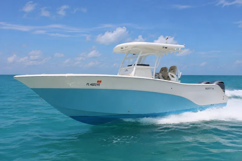 The Image of 2016 Sea Fox 288 Commander boat cruising on clear blue ocean waters. - 0