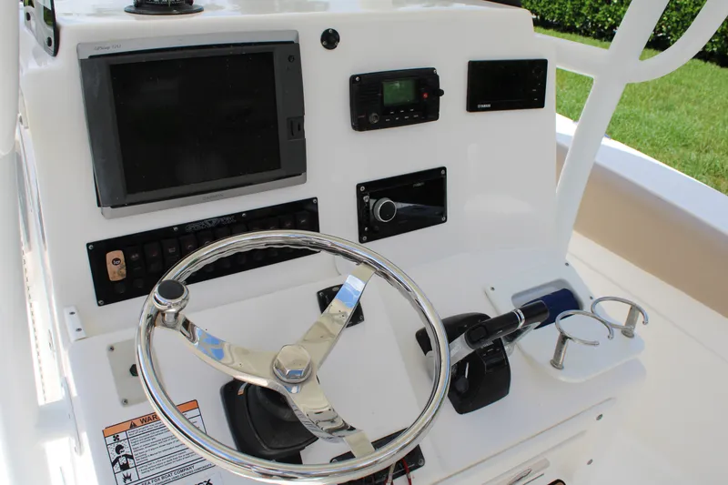 Slide: The Image of Steering console of 2016 Sea Fox 288 Commander boat with navigation equipment. - 21