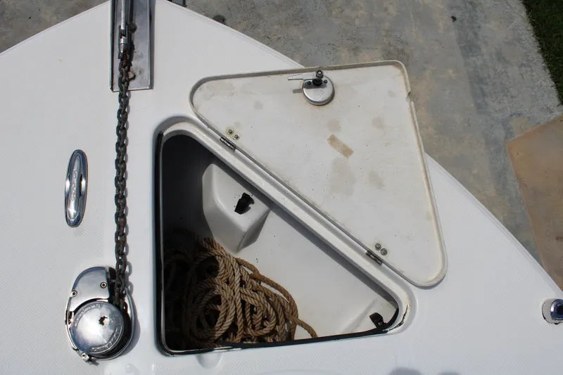 Slide: The Image of Anchor locker of 2016 Sea Fox 288 Commander with rope and chain. - 12