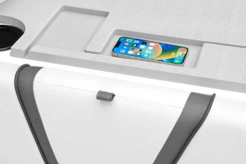 Slide: The Image of Yamaha Boats SX220 2027 interior with smartphone holder and sleek design. - 8