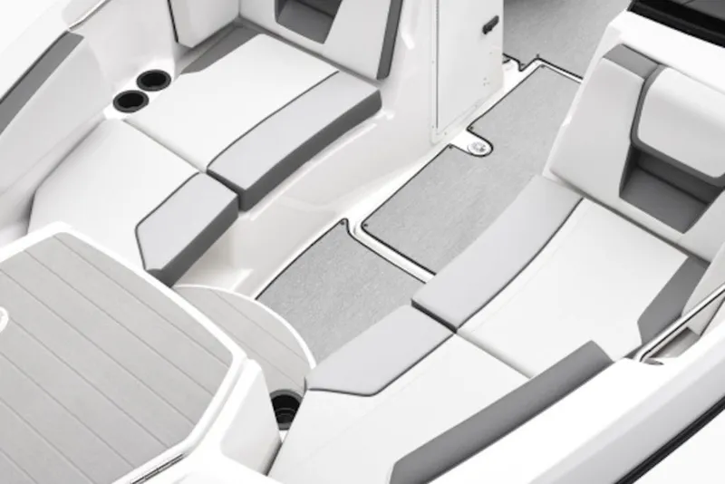 Slide: The Image of Interior view of 2027 Yamaha Boats SX220, featuring sleek white and gray seating. - 6