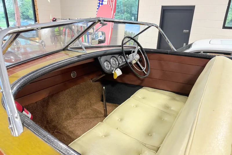 Slide: The Image of 1955 Chris Craft Chriscraft boat interior with vintage steering wheel and gauges. - 4