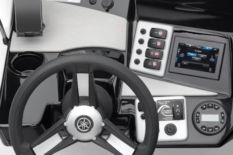 Slide: The Image of Steering console of 2027 Yamaha Boats 220 AR with modern controls and touchscreen display. - 5