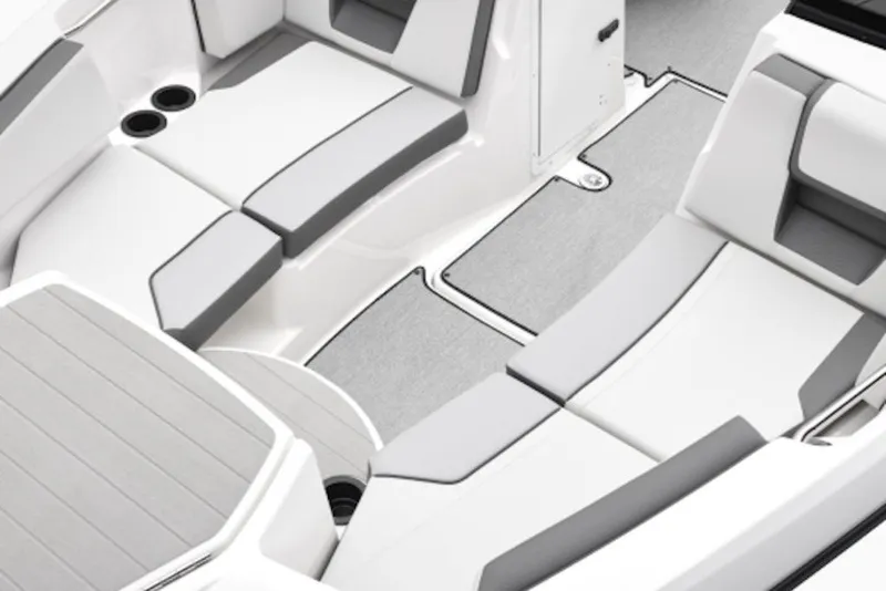 Slide: The Image of Interior seating of 2027 Yamaha Boats 220 AR, featuring sleek gray and white upholstery. - 4