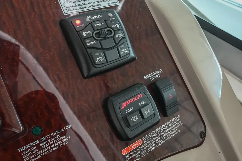 Slide: The Image of Control panel of a 2011 Sea Ray Sundancer 330 boat with Mercury and Axius systems. - 22