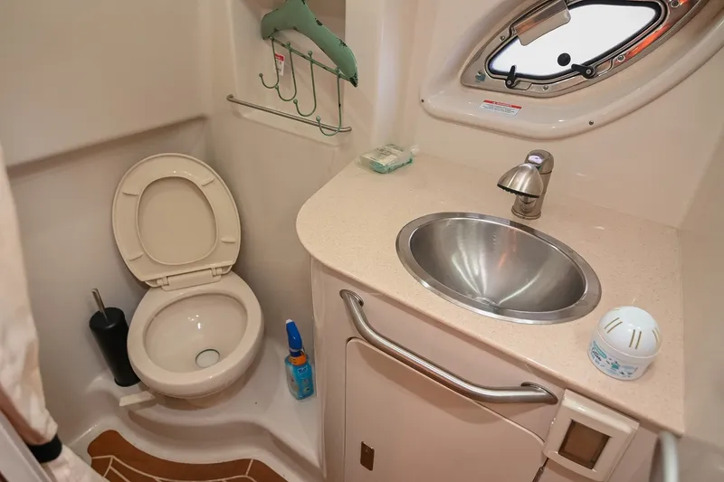 Slide: The Image of Bathroom interior of 2011 Sea Ray Sundancer 330 yacht with toilet and sink. - 49