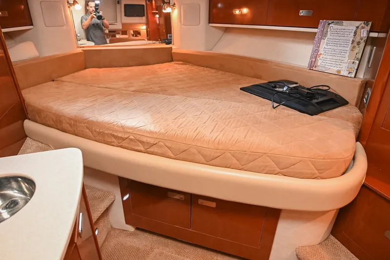 Slide: The Image of Luxurious cabin interior of 2011 Sea Ray Sundancer 330 yacht with cozy bed. - 40