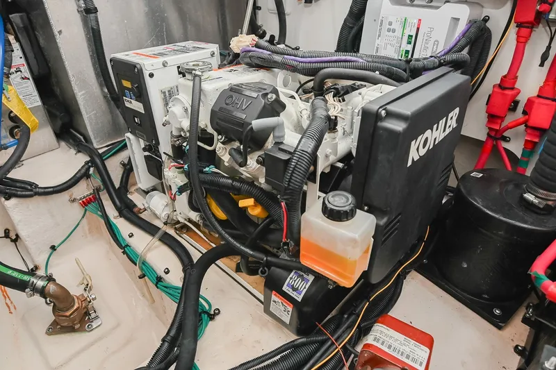 Slide: The Image of Engine room of 2011 Sea Ray Sundancer 330 with Kohler generator. - 55