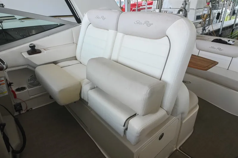 Slide: The Image of Luxurious white seating on 2011 Sea Ray Sundancer 330 yacht, featuring comfortable design. - 17