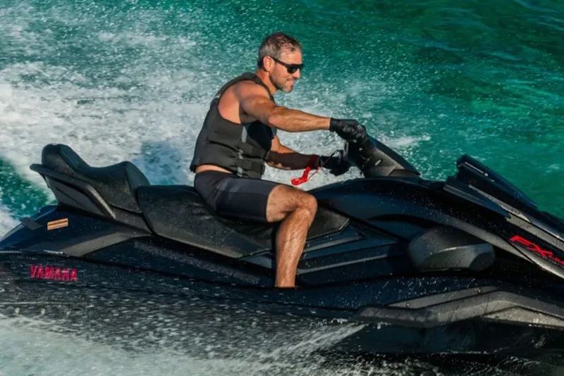 Slide: The Image of Man riding 2027 Yamaha WaveRunner FX Limited SVHO on clear blue water. - 6