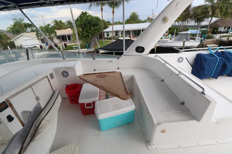 Slide: The Image of Flybridge of 1988 Jefferson Marquessa 60 MY yacht with seating and coolers. - 10