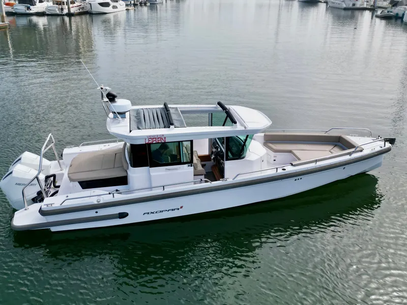 Slide: The Image of Axopar 28 Cabin 2023 - 2