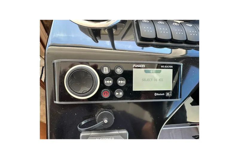Slide: The Image of Fusion MS-RA70N stereo system on 2024 Beneteau Antares 11 Fly boat dashboard. - 32