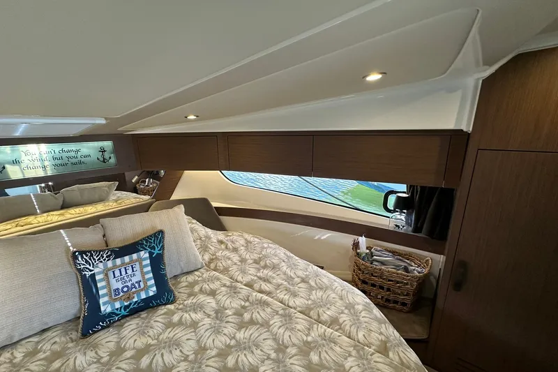 Slide: The Image of Luxurious cabin interior of 2024 Beneteau Antares 11 Fly with cozy bedding and decor. - 87