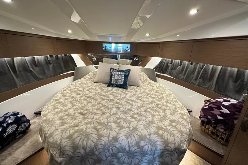 Slide: The Image of Luxurious cabin interior of 2024 Beneteau Antares 11 Fly with cozy bedding. - 37