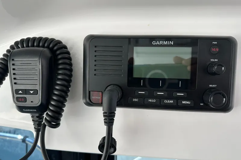 Slide: The Image of Garmin marine radio system on 2024 Beneteau Antares 11 Fly boat dashboard. - 65