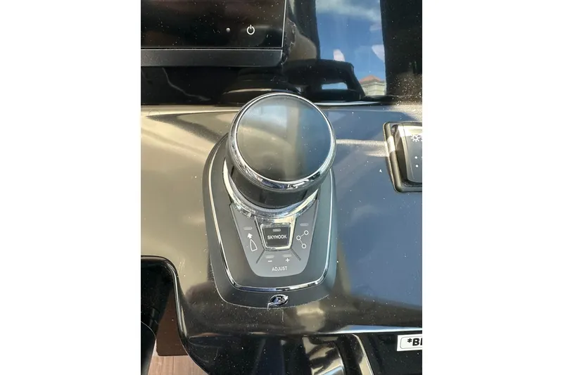 Slide: The Image of Control panel of 2024 Beneteau Antares 11 Fly boat, featuring joystick and buttons. - 34