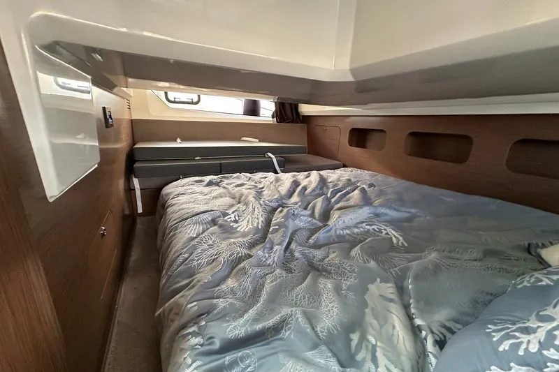 Slide: The Image of Luxurious cabin interior of 2024 Beneteau Antares 11 Fly with cozy bedding. - 74