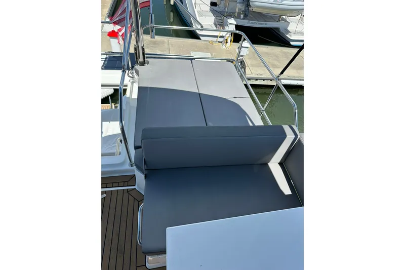 Slide: The Image of 2024 Beneteau Antares 11 Fly yacht with sleek seating on deck. - 24