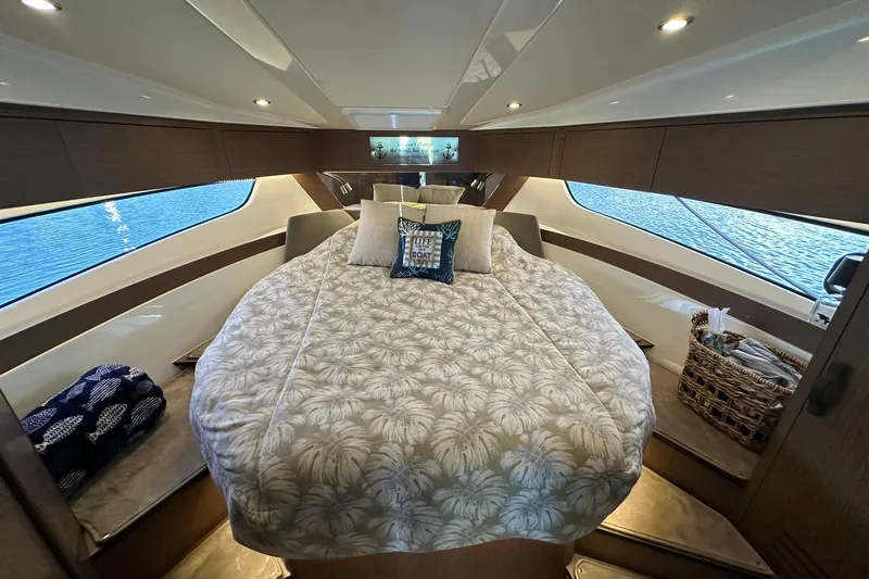 Slide: The Image of Luxurious cabin interior of 2024 Beneteau Antares 11 Fly with elegant bedding and decor. - 83