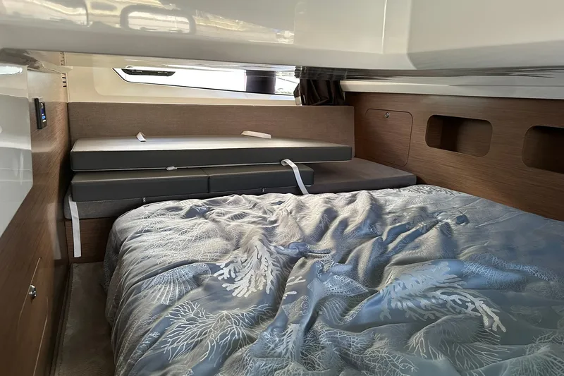 Slide: The Image of Luxurious cabin interior of 2024 Beneteau Antares 11 Fly with elegant bedding. - 75