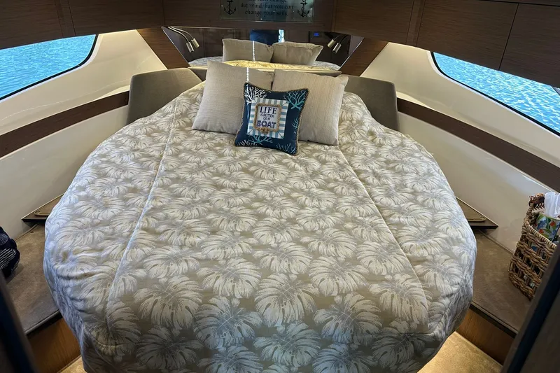 Slide: The Image of Luxurious cabin interior of 2024 Beneteau Antares 11 Fly with cozy bedding. - 84
