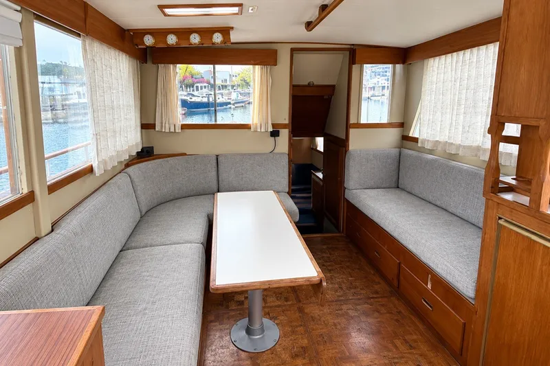Slide: The Image of Interior of 1978 Grand Banks 36 Classic yacht with cozy seating and dining area. - 19