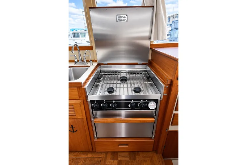 Slide: The Image of Stainless steel stove in 1978 Grand Banks 36 Classic yacht kitchen. - 22