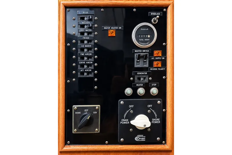 Slide: The Image of Electrical control panel of a 1978 Grand Banks 36 Classic boat. - 15