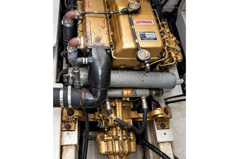 Slide: The Image of Engine of a 1978 Grand Banks 36 Classic boat, featuring a Lehman diesel engine. - 33