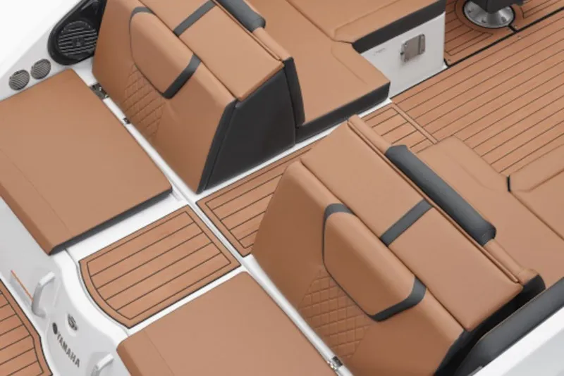 Slide: The Image of 2026 Yamaha Boats 222SE interior with tan seating and sleek design. - 9