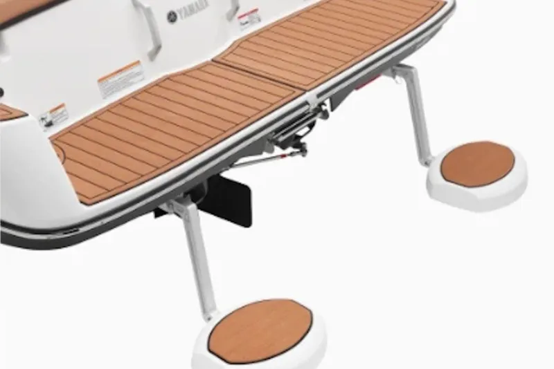 Slide: The Image of 2027 Yamaha Boats 222SD swim platform with teak finish and retractable steps. - 4